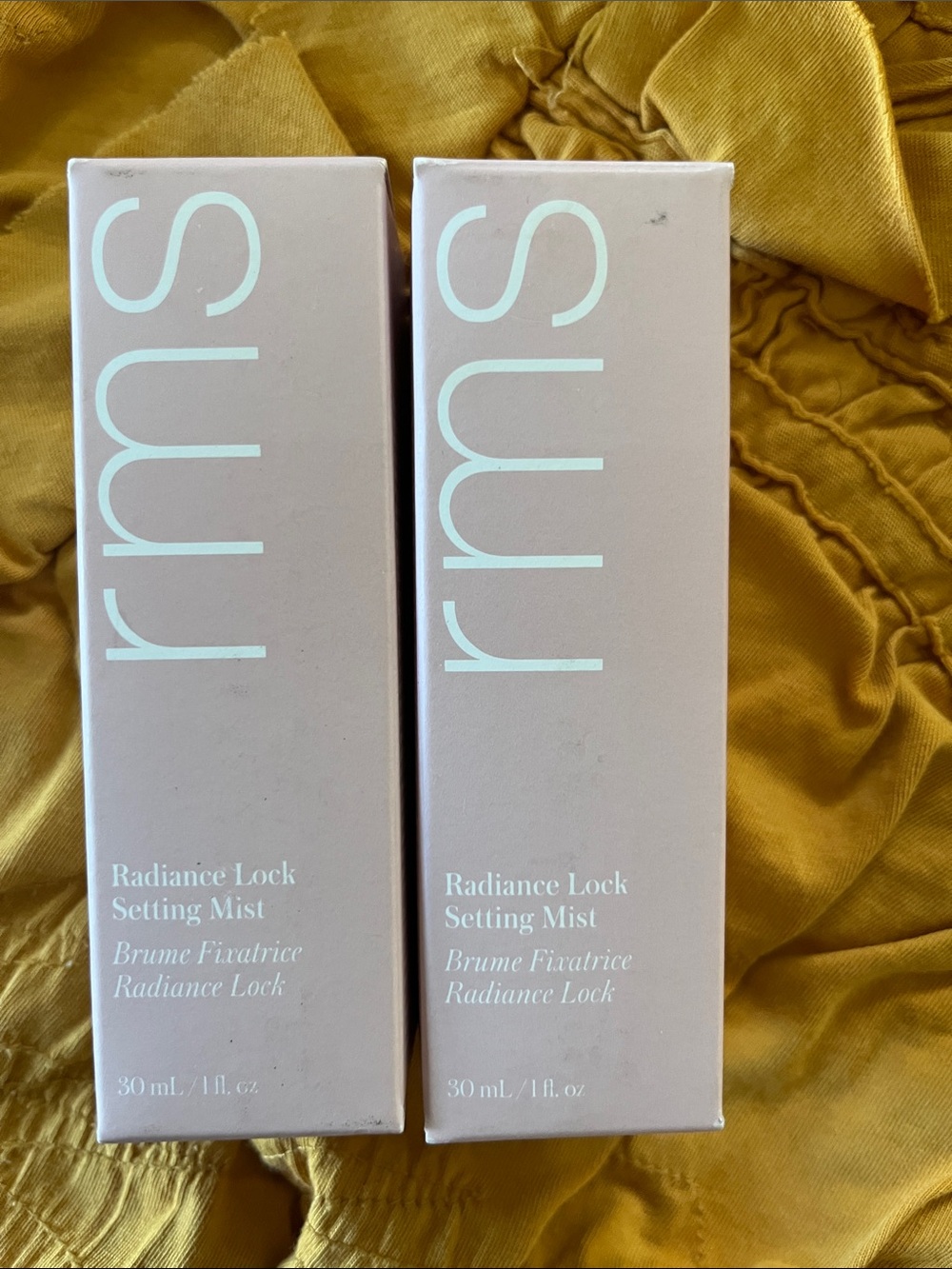 NWT RMS Radiance Lock Setting Mist and one free!